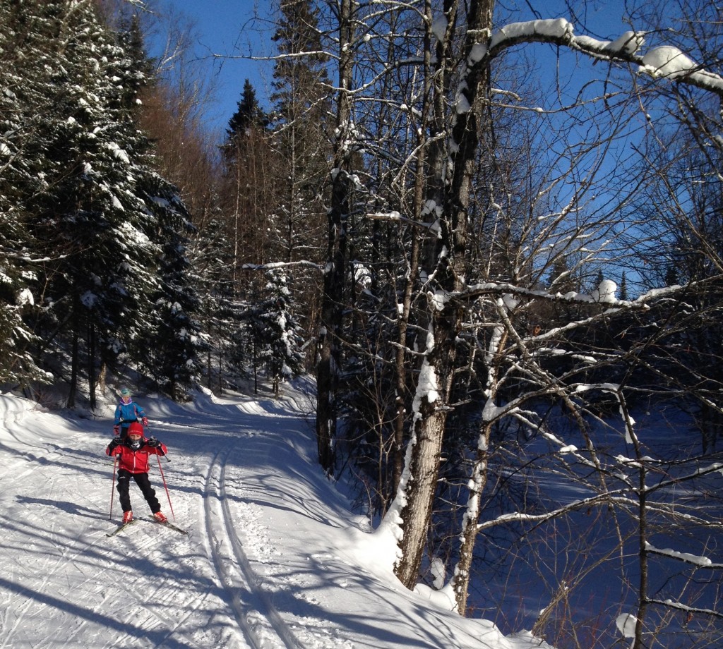 Skiing back to the chalet along the river trail